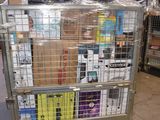 a metal cart with many items in it in a warehouse