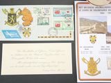 a picture of a collection of stamps and postcards on a table