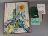 un tableau représentant un tournesol accroché au mur