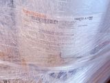 a plastic bag wrapped around a toilet in a room