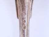 a close up of a spoon on a table