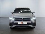 the front view of a silver volkswagen vw cross