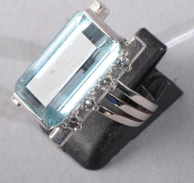an image of a ring with a blue topaz stone