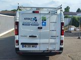 a white van that is parked in a lot