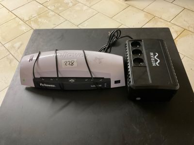an image of a remote control sitting on top of a table