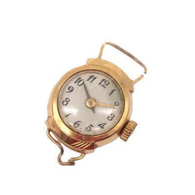 a gold watch with a chain around it on a white background