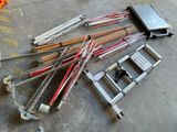 a lot of tools that are laying out on the floor
