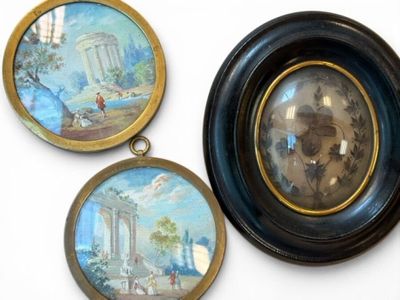 three framed pictures of a painting and a clock on a wall