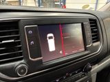 a picture of a car dashboard with a cell phone in it