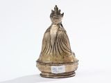 an antique silver statue of a woman with a crown on her head