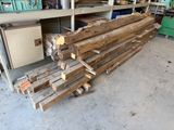 many pieces of wood stacked on top of each other