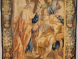 an image of a tapestry hanging on the wall of a room