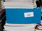 a stack of papers sitting on top of a table