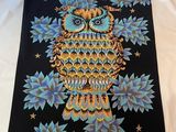 une image représentant un tableau où l'on voit un hibou perché sur une branche d'arbre