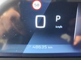 a close up of a car ' s dashboard showing the speed of the car