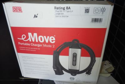 une image représentant une boîte à laquelle est fixé un chargeur