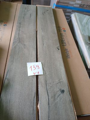 several pieces of wood are stacked on top of each other on a table