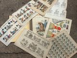 a pile of old postcards sitting on the ground