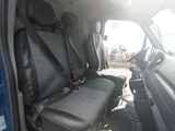 a seat in the back of a van that is empty