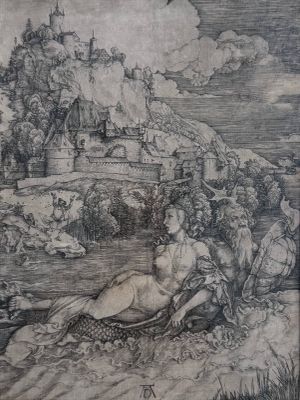 une image représentant le dessin d'une femme allongée par terre
