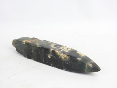 an image of a stone object on a white surface
