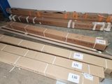 many boxes of cardboard sitting on the floor next to each other