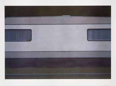 une photo d'un train qui avance sur les rails
