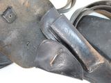a pair of shoes and a bag on a table