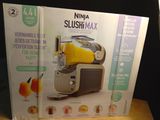 a box with a picture of a juicer inside of it