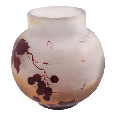 a glass vase with a design on it on a white background