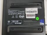 a laptop battery that is connected to a charger