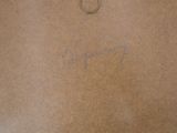 a picture of a brown box with a ring on top of it