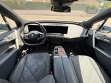 a view of the inside of a car from the driver ' s seat