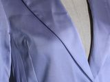 the back of a purple jacket on a mannequin mannequin mannequin mannequin mannequin mannequin mannequin mannequin