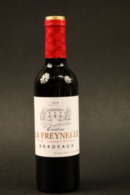 a bottle of wine that is sitting on a table