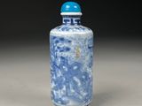 blue and white porcelain snuff bottle with a blue lid