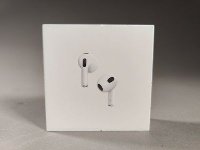 a white box with a pair of airpods on it