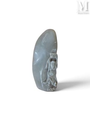 une image représentant une sculpture en pierre d'un homme et d'une femme