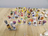a lot of figurines that are on the table