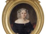 portrait of a woman in a black dress in a gold frame
