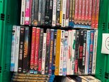 a green box filled with dvds and dvds