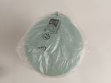 a plastic bag that has a piece of cake in it
