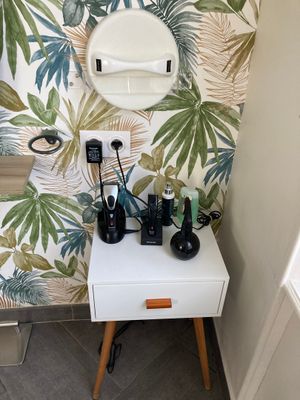 a bathroom with a sink and a mirror on the wall