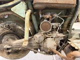 an old motorcycle that has been rusted and rusted