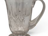 an image of a clear glass pitcher on a white background