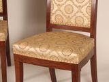 pair of mahogany dining chairs with upholstered upholstered seats