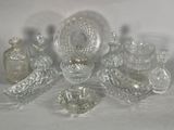 a lot of glass items that are on a table