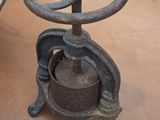 an old fashioned machine that is sitting on the floor