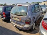 many cars parked in a parking lot near each other
