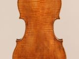 an antique violin with the back of the back of the violin